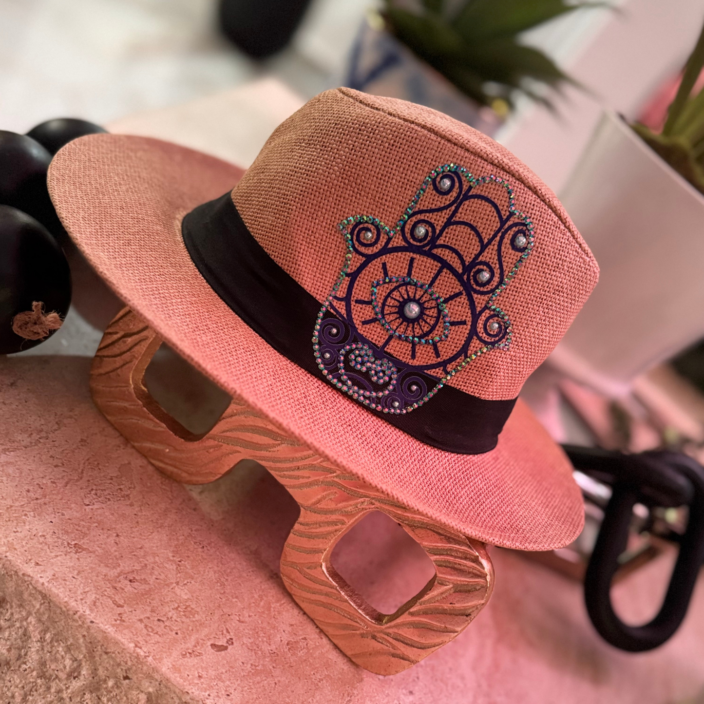 Handmade straw hat with Evil Eye rhinestone design for protection