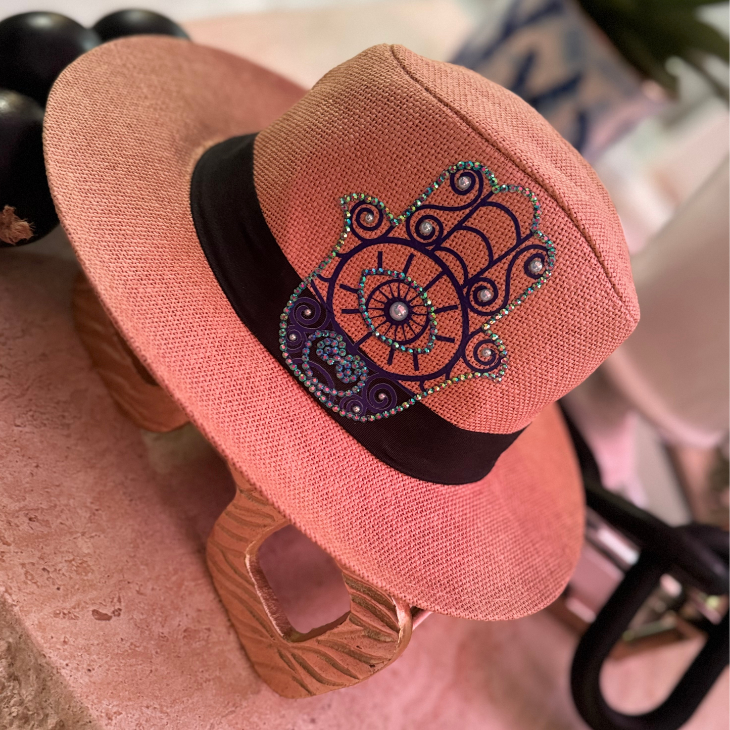 Handmade straw hat with Evil Eye rhinestone design for protection